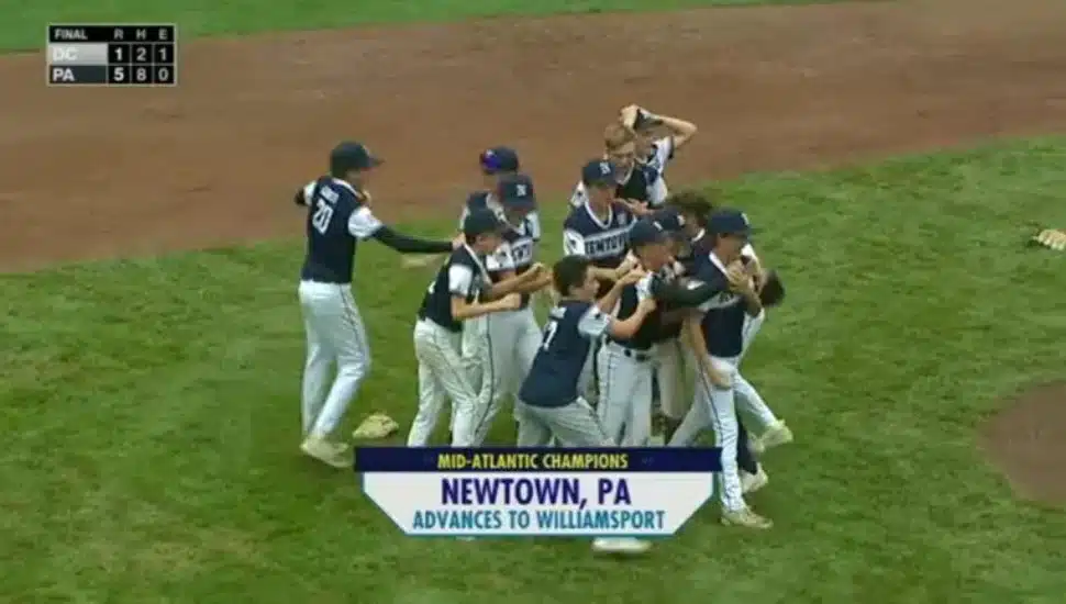 Little league newtown team huddling