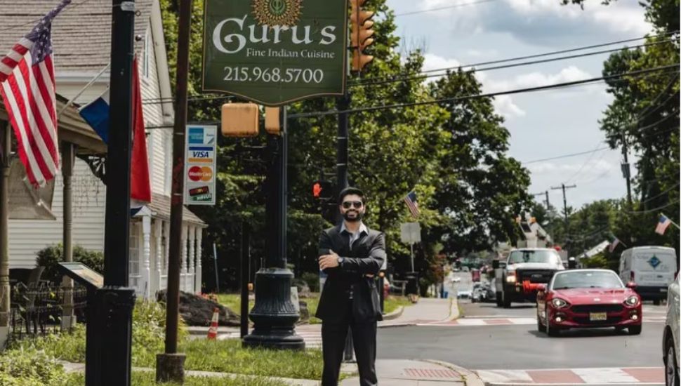 Owner Samarth Joshi outside of Guru's Indian Cuisine, 203 N. Sycamore Street in Newtown.