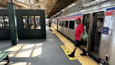 Man gets off a SEPTA TRain at 30th Street Station in Philadelphia