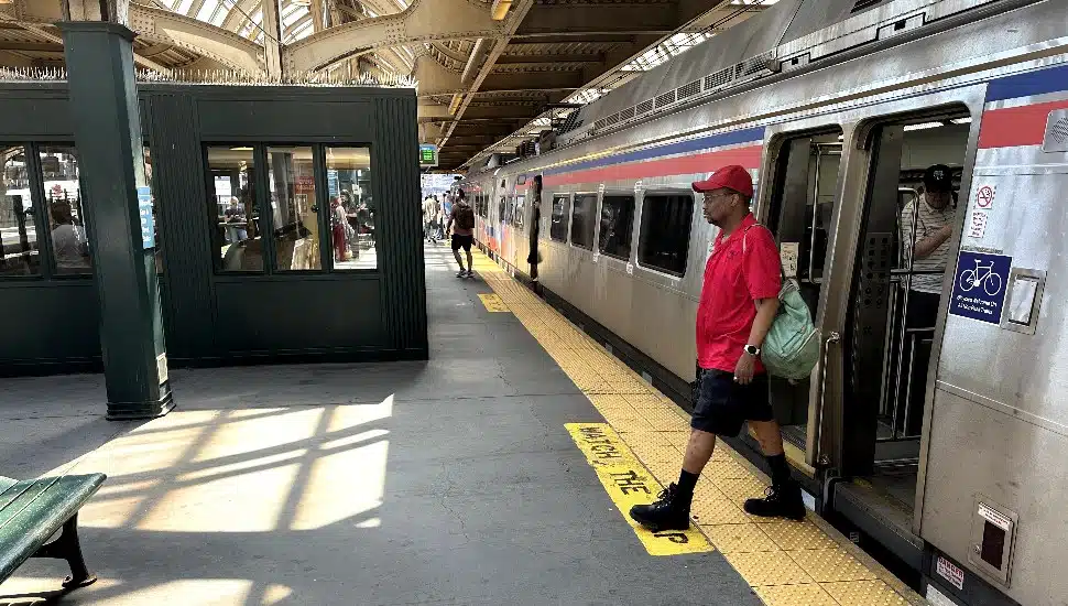 Man gets off a SEPTA TRain at 30th Street Station in Philadelphia