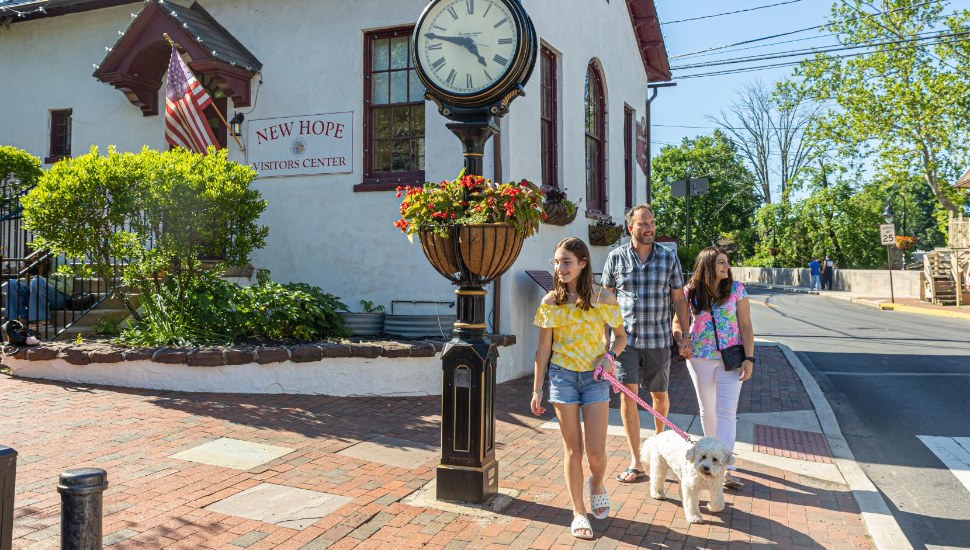 Family with a dog walk in New Hope.