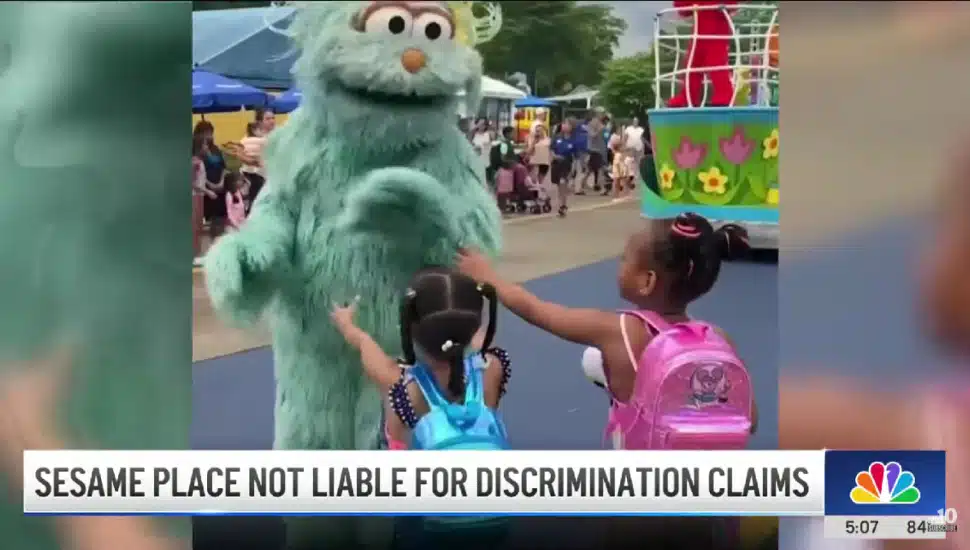 Rosita ignoring two young Black girls at Sesame Place.