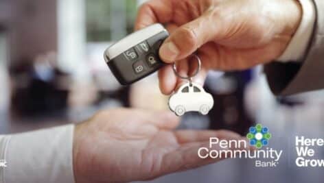 Picture of hand grabbing keys to car.