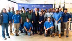 Photo Caption #1: BCCC President & CEO Dr. Patrick M. Jones and Director of Workforce Development Initiatives for PA Department of Community & Economic Development Gwen Ross pictured with BCCC manufacturing and trades students.