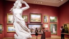 People enjoying exhibits inside Philadelphia Museum of Art.