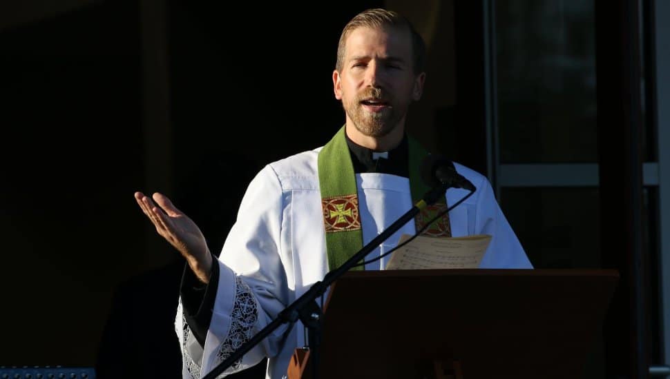 Pastor Thomas Rusert preaches a sermon.