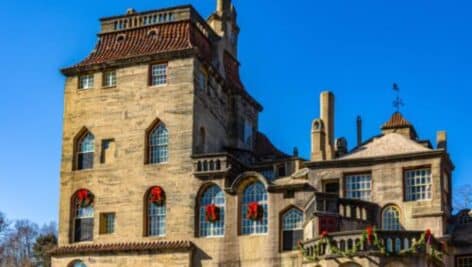 Fonthill Castle exterior with holiday decorations.