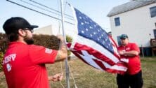 Navy veteran and Comcast technical operations supervisor works with Operation Red Flag to replace worn U.S. flags within Bucks County.