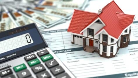 Mortgage calculator, house, and documents.