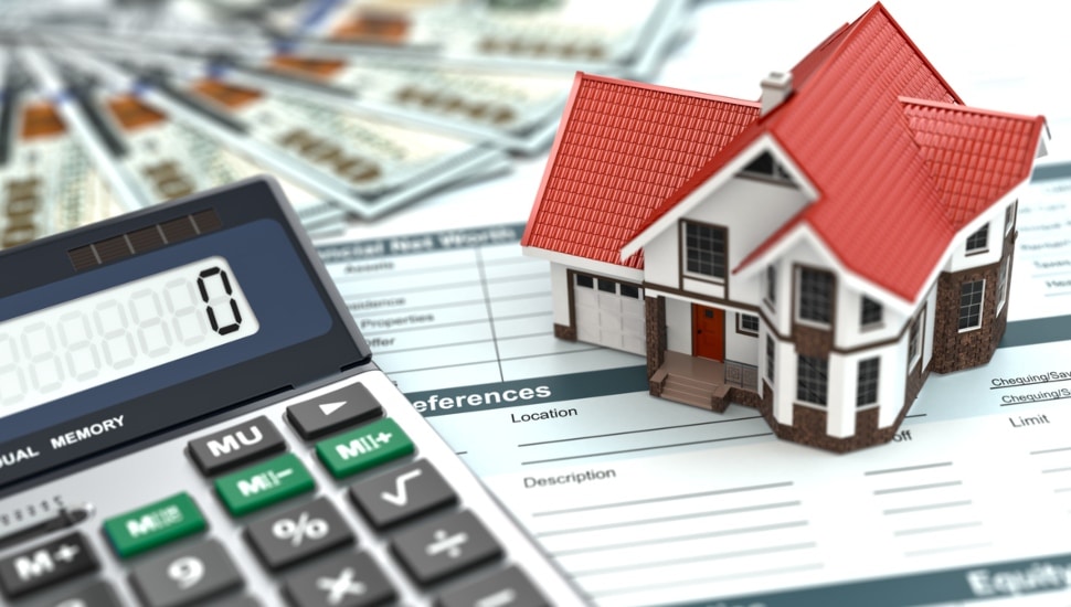 Mortgage calculator, house, and documents.