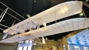 A Wright Brothers plane hangs from the ceiling at The Franklin Institute in Philadelphia.