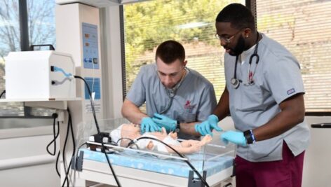 nursing students in a simulation lab