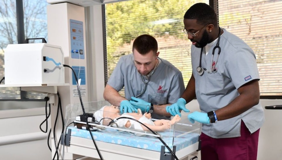 nursing students in a simulation lab