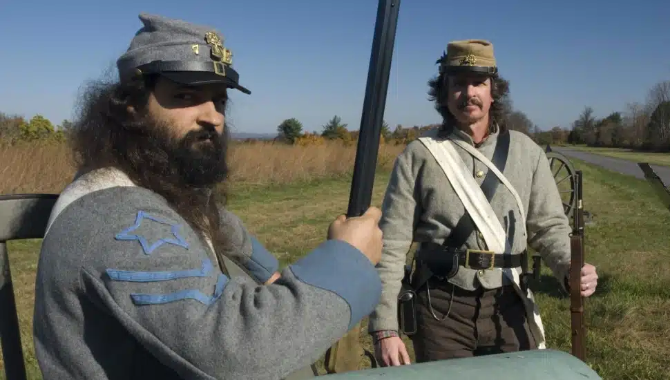 Two Civil War soldier reenactors.