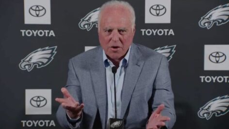 Jeffrey Lurie speaking at a press conference.