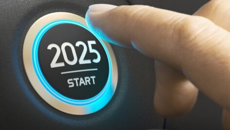 Person pushes button to start 2025.