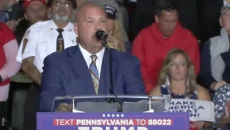 Ted Christian addresses the crowd at a Trump rally.