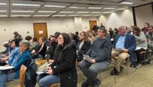 A packed Delaware County council meeting room.