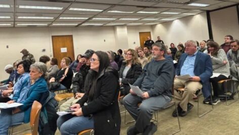 A packed Delaware County council meeting room.