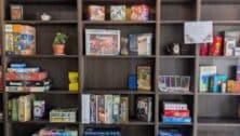 Wall of board games at Parlour Tabletop and Tome.