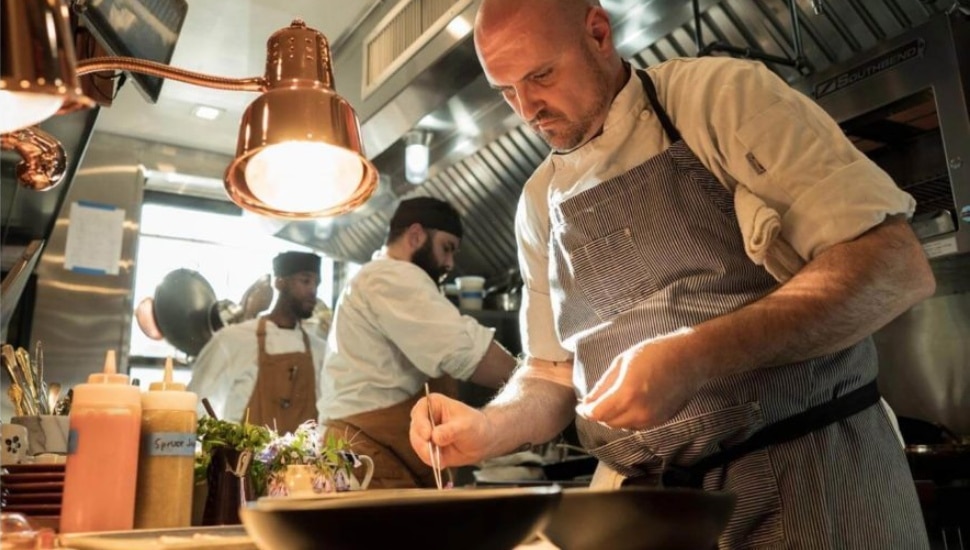 Chef Adam Diltz cooking.