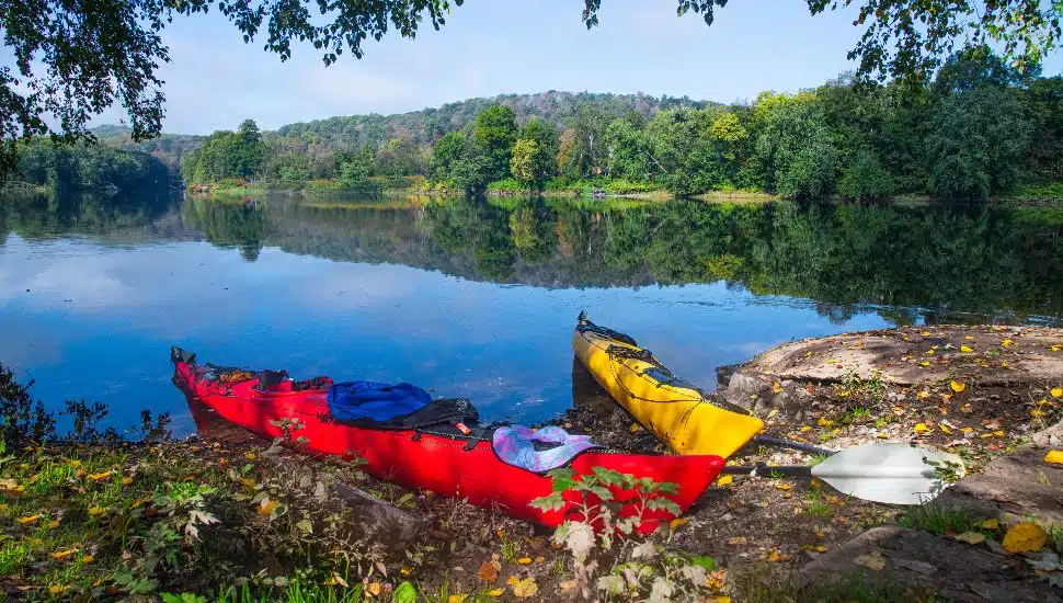 red and yellow kayak on the banks of the Delaware River in Worthington State Forest