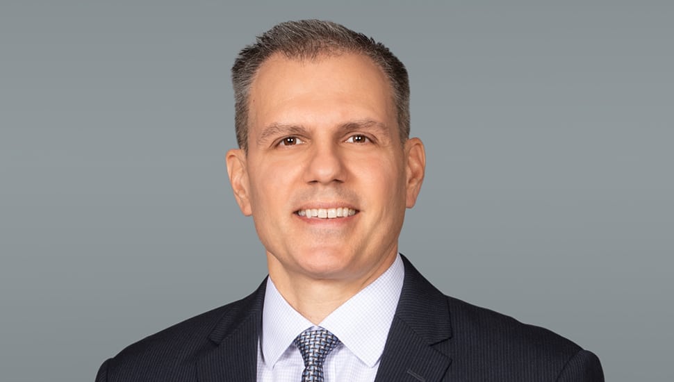 Headshot of middle-aged white male accounting executive.
