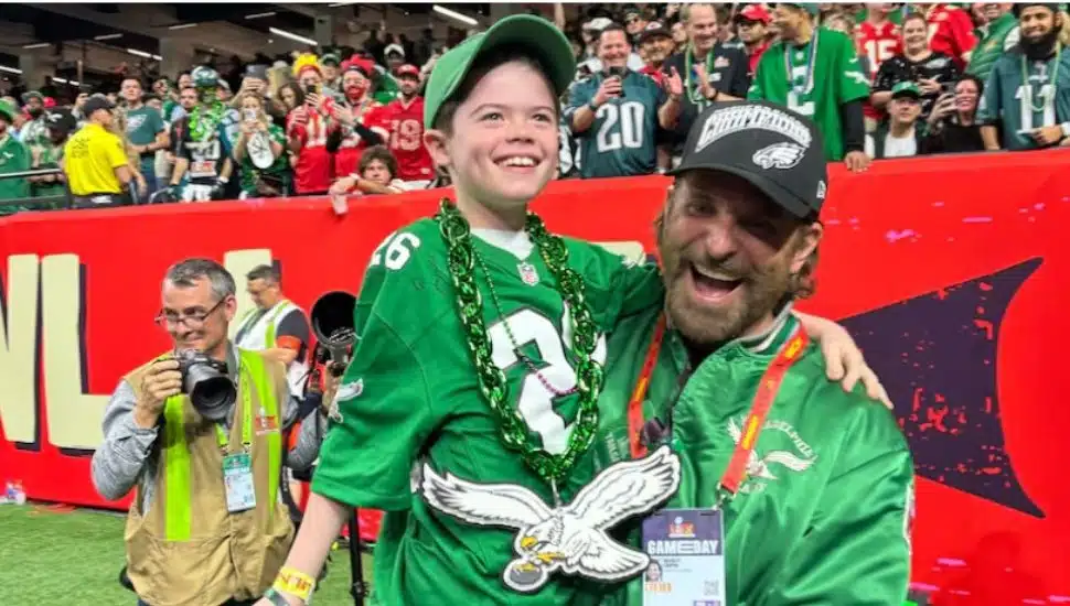 Declan LeBaron with Bradley Cooper at the Super Bowl.