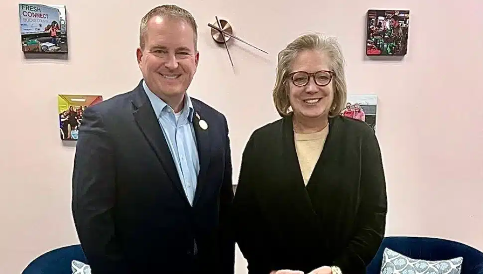 Christine Martin (left) and Rep. Brian Munroe (right)