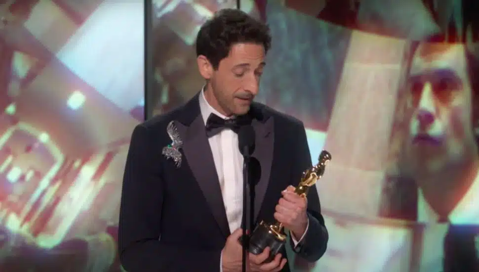 Adrian Brody accepts his award for Best Actor at the Oscars.