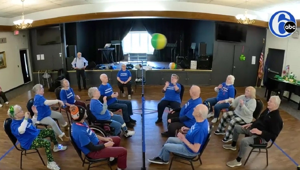 Seniors at Central Bucks Senior Activity Center playing chair volleyball.