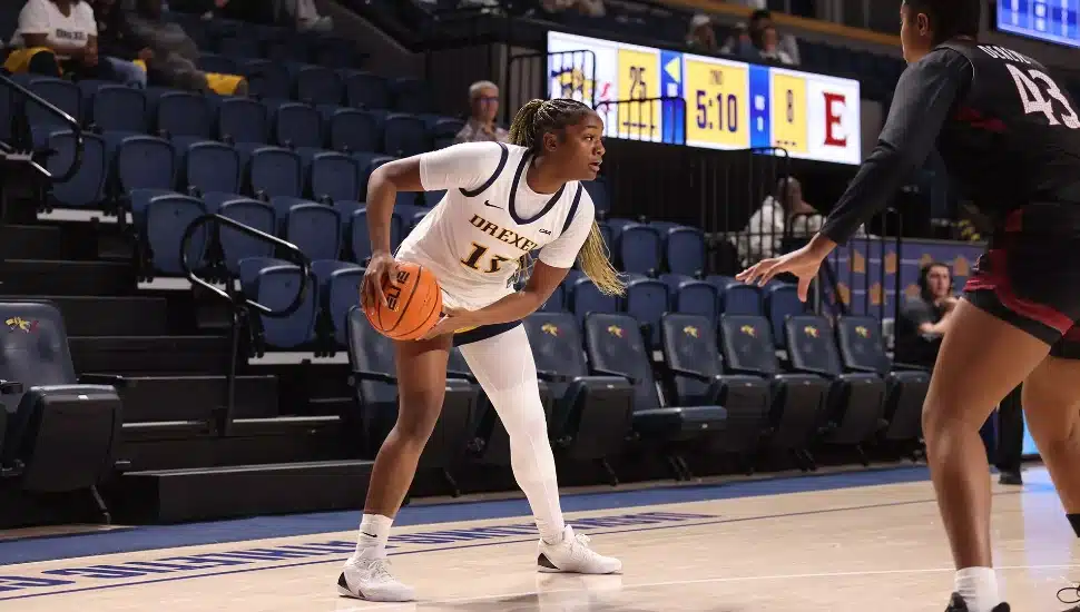 Deja Evans looks to pass the ball.