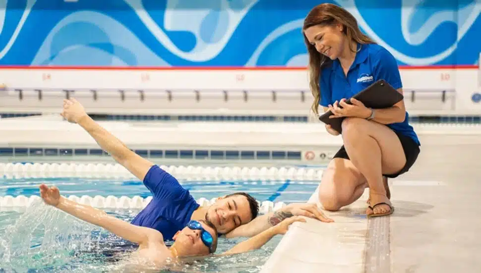 Instructor poolside at Big Blue Swim School