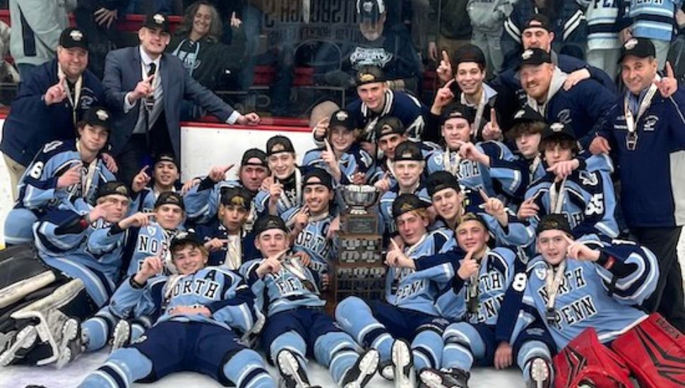 The North Penn Knights gather after their state championship victory.