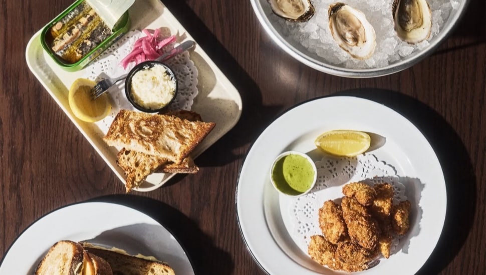 A table of dishes with food.