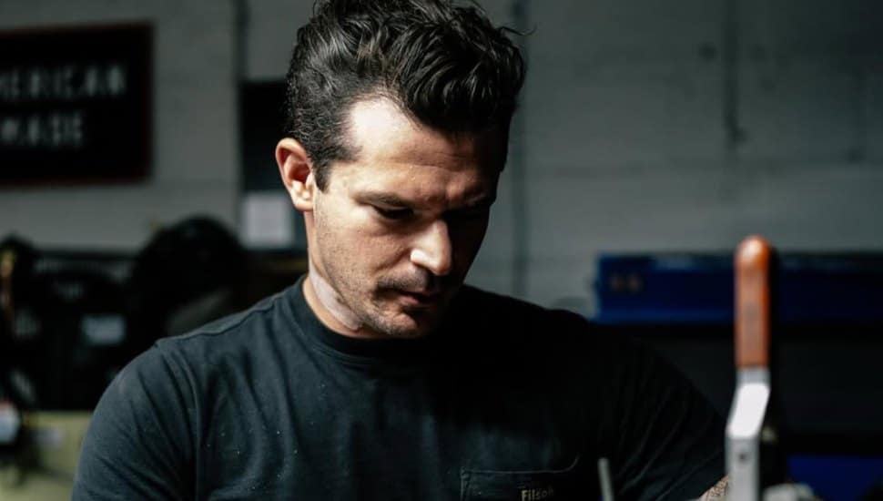 Steve Pellegrino works on a knife in his studio.