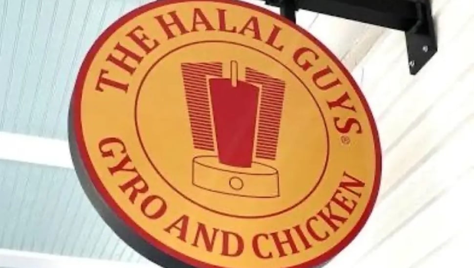 The Halal Guys sign at the Village at Newtown Shopping Center.