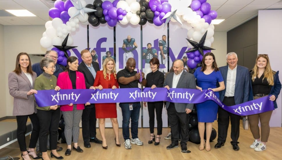 Staff and local officials are on hand for the ribbon-cutting ceremony at a new Xfinity store in Villanova.