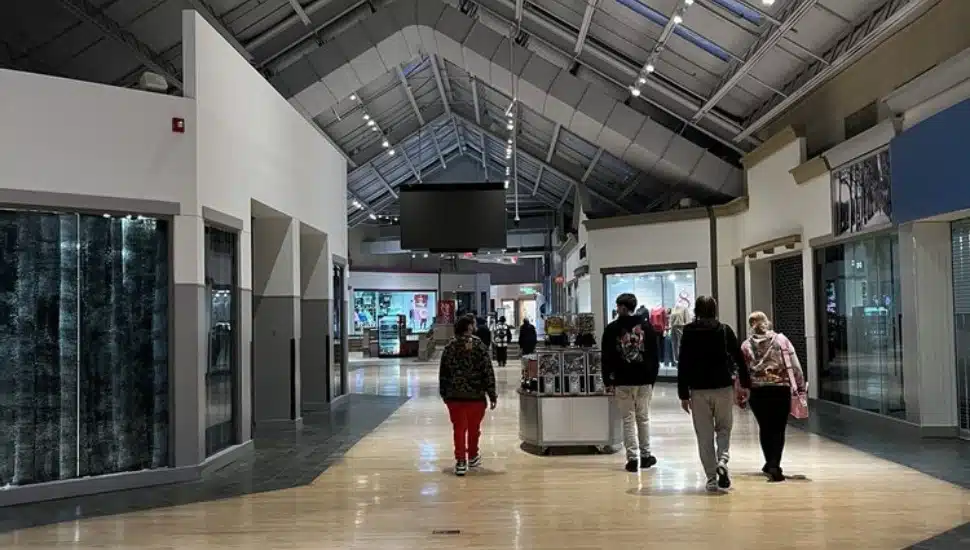 People walking inside Franklin Mall.