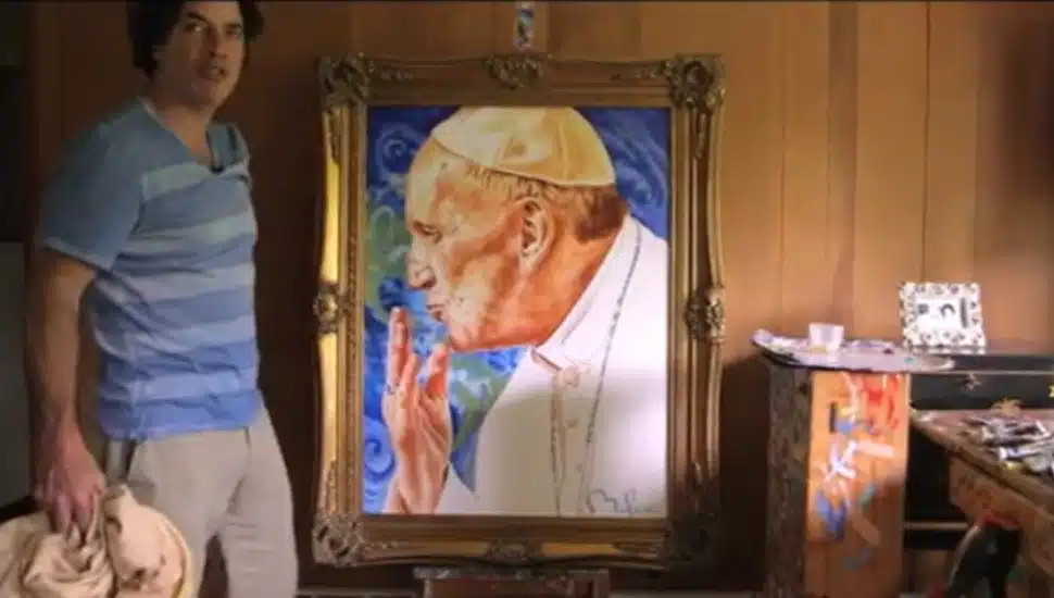 Upper Makefield pop artist Perry Milou with his official portrait of Pope Francis.