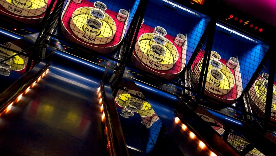 Skee-ball setup at a carnival.