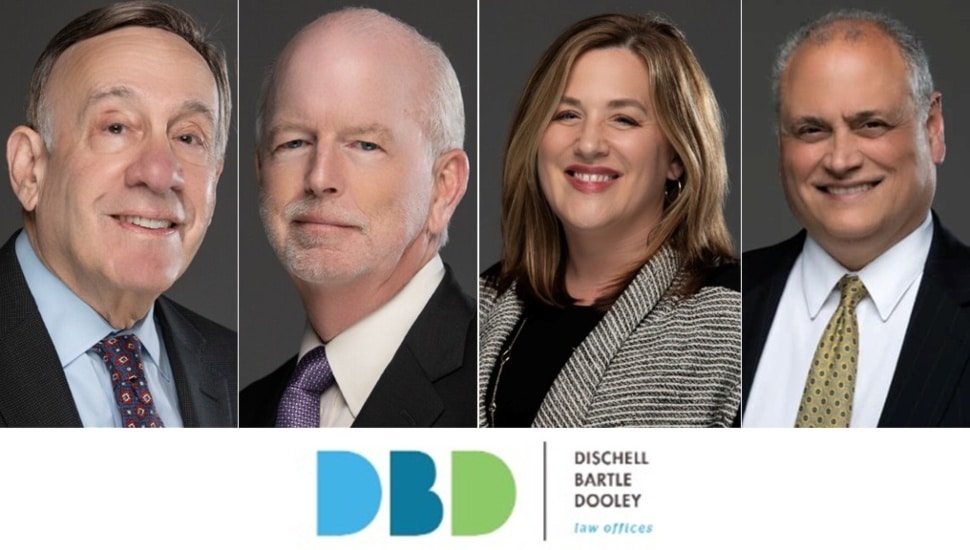 Headshot of three distinguished male lawyers and one female lawyer.