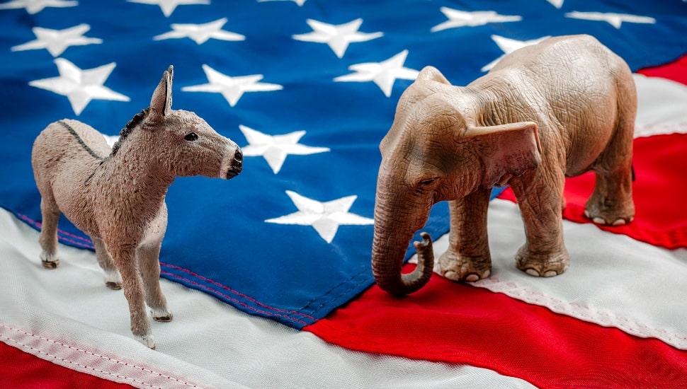 Democrats vs Republicans are facing off in an ideological duel on the American flag.