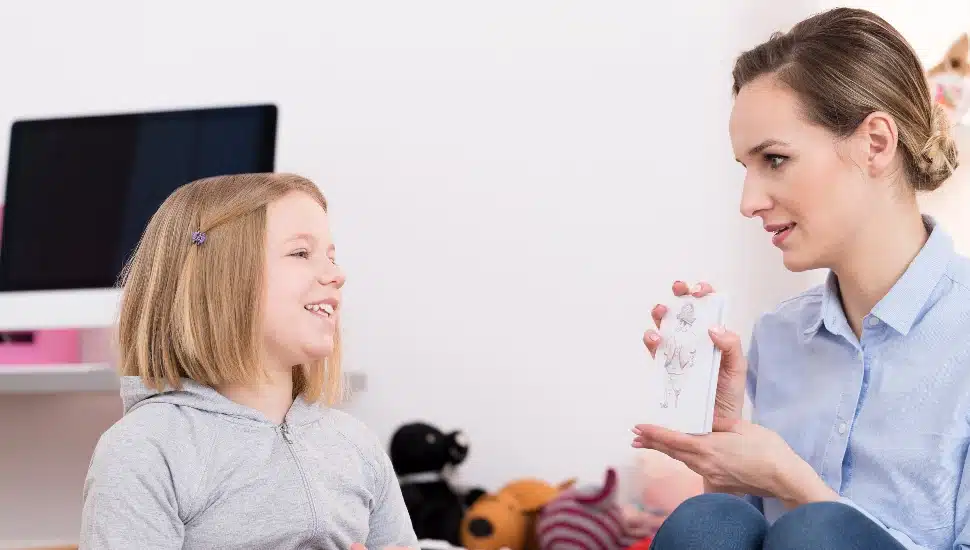 Mother and daughter having a sex education discussion at home