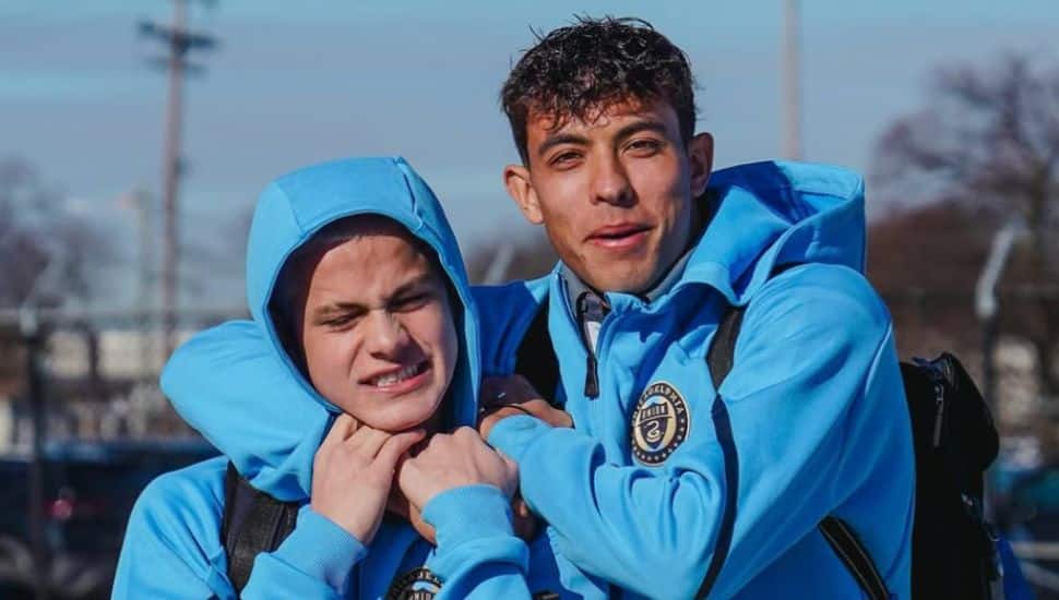 Quinn Sullivan wraps his arm around his younger brother Cavan.