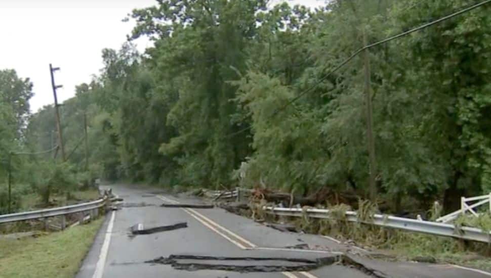 A road was destroyed from flooding in Upper Makefield.