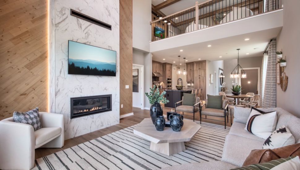 The two-story living room in a Toll Brothers carriage home.