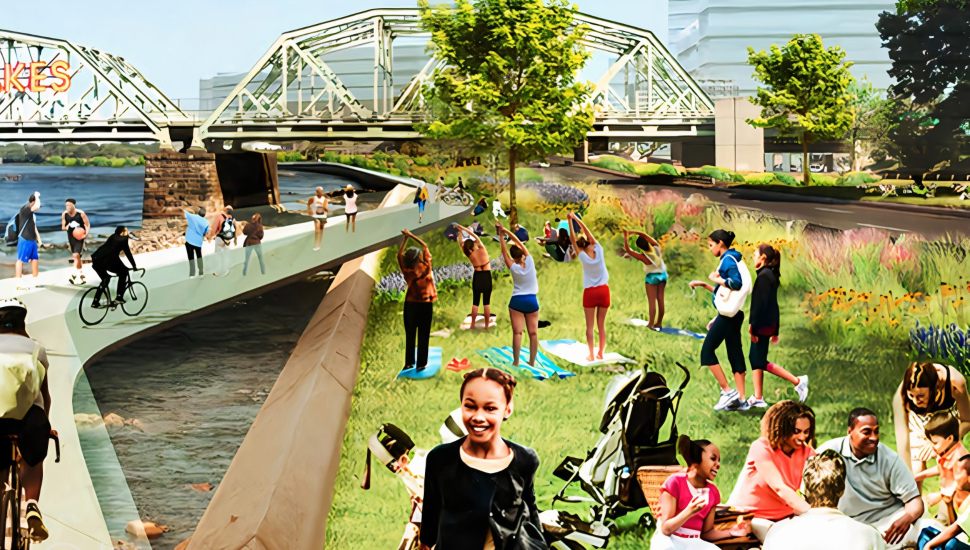 A rendering of a redesigned Route 29 in Trenton showing people enjoying themselves on a grassy area outdoors next to the Delaware River.