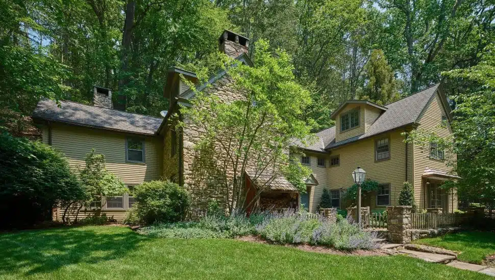 5960 Honey Hollow Road house surrounded greenery.