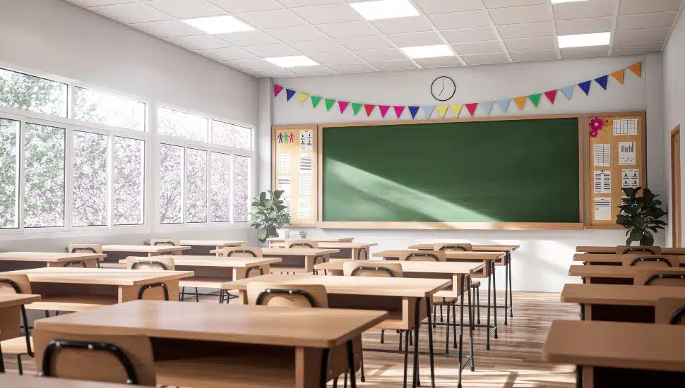 Empty elementary school classroom with chalk board.